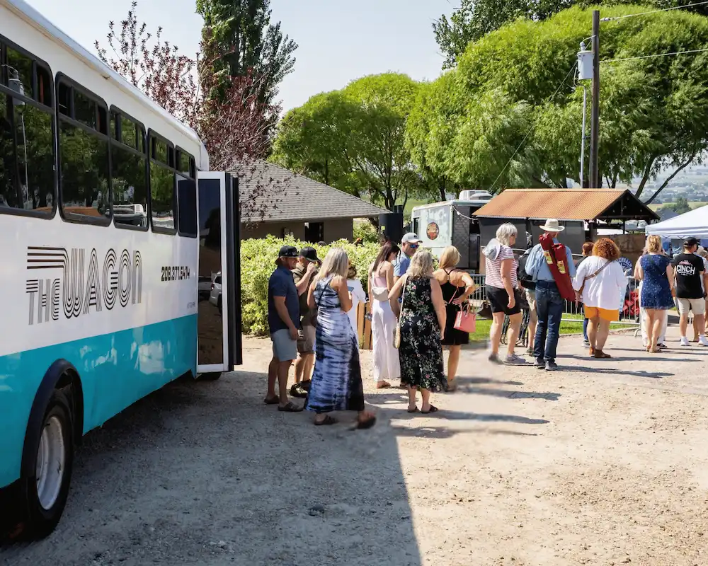 Guests boarding The Wagon grounds shuttle at the Sunnyslope Wine Festival
